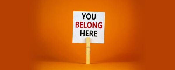 not belonging – a sign that says you belong here